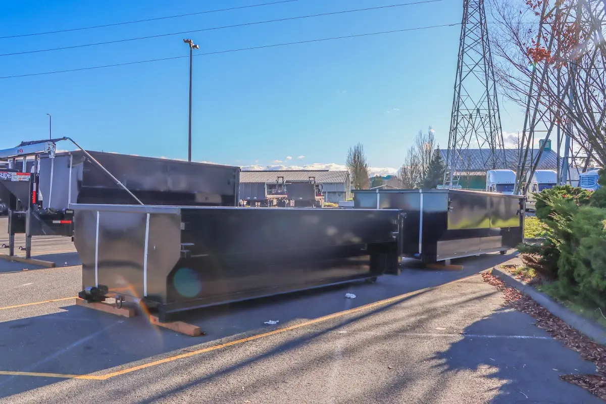 Roll-off dumpster ready for waste disposal at job site for 2 Yard Dumpster Rental in Iowa Park